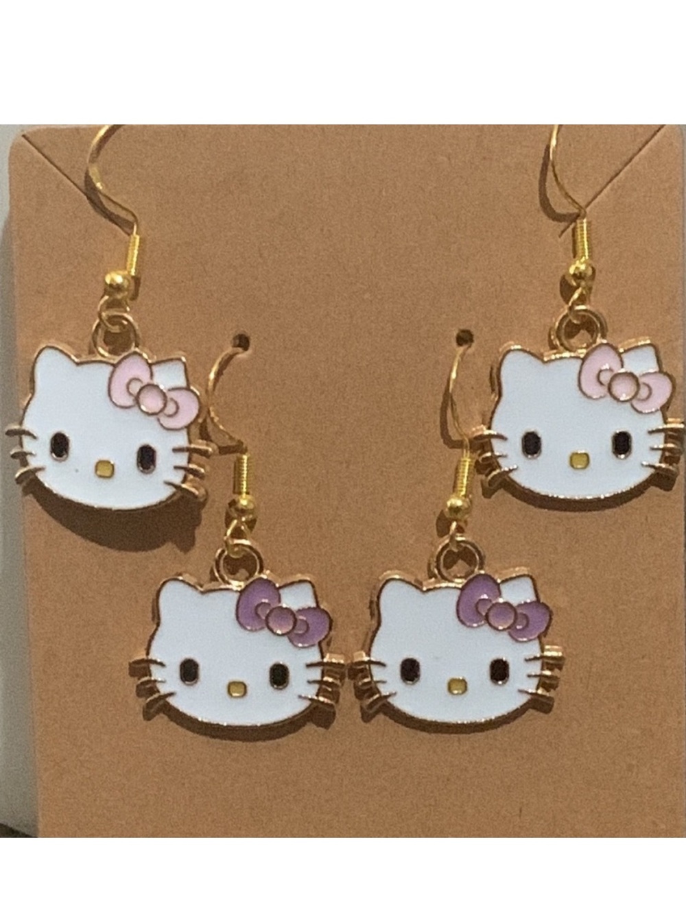 2 Pairs Hello Kitty Purple and Pink- Gold Earrings